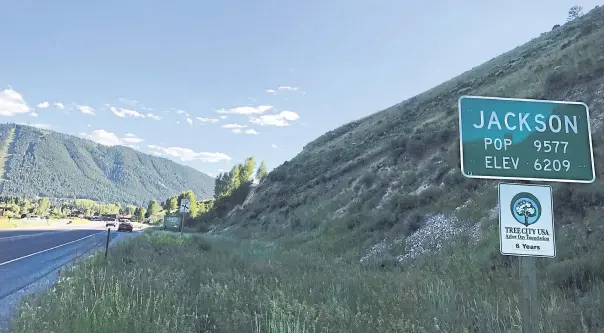  ??  ?? A road sign greets travellers on the side of Highway 89 in Jackson, Wyoming.