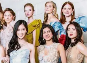  ??  ?? Diverse affair: Today’s ‘Le Bal’ is a microcosm of the shifting tides of the global elite like Yao (far right, front row).