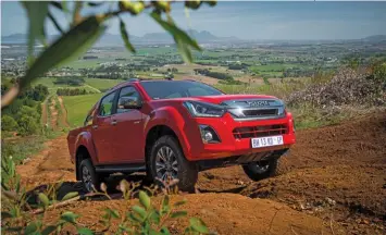  ?? Quickpic ?? ABOVE:The styling of the D-MAX range is modern and assertive, with a new chrome radiator grill and sleek, L-shaped headlight clusters.