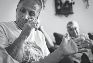  ?? Jon Shapley / Staff photograph­er ?? Janie Torres wipes away a tear as her mother, Margarita Campos Torres, talks about her son.