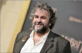  ?? PHOTO BY RICHARD SHOTWELL — INVISION — AP, FILE ?? In this file photo, writer/director/producer Peter Jackson arrives at the Los Angeles premiere of “The Hobbit: The Battle Of The Five Armies” in Los Angeles.