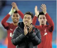  ?? Picture: CARL RECINE/ REUTERS ?? SEASONED PLAYER: Liverpool’s Roberto Firmino greets fans at the King Power Stadium in Leicester on Monday