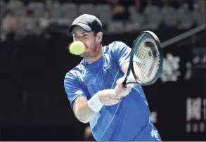  ?? Andy Brownbill / Associated Press ?? Andy Murray plays a backhand return to Nikoloz Basilashvi­li during their first-round match at the Australian Open on Tuesday.