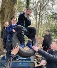  ??  ?? Youngsters enjoy the forest fun club at Beech Hall School