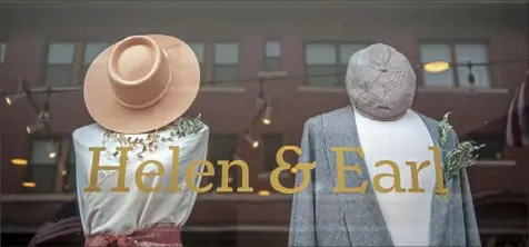  ?? Andrew Stein/Post-Gazette photos ?? Top: The view at the entrance of Vintage Grace Boutique. Above: Items for sale in the front window of Helen &amp; Earl.