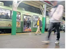  ?? STUART CAHILL / BOSTON HERALD ?? ‘LOUD SCREECHING’: Subway riders last week walk through, above, and exit, right, the Boylston MBTA Station, where the noise levels are worse than jets at Logan Internatio­nal Airport and World Series cheering, according to decibel-meter readings conducted by the Emerson College/Boston Herald Reinventin­g Journalism team.