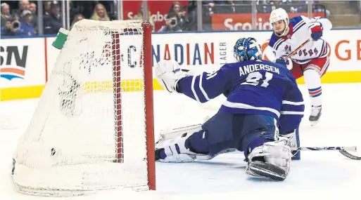  ?? STEVE RUSSELL TORONTO STAR ?? After the Leafs charged back to force overtime, the Rangers’ Tony DeAngelo ended it in a hurry, beating netminder Frederik Andersen 52 seconds in.