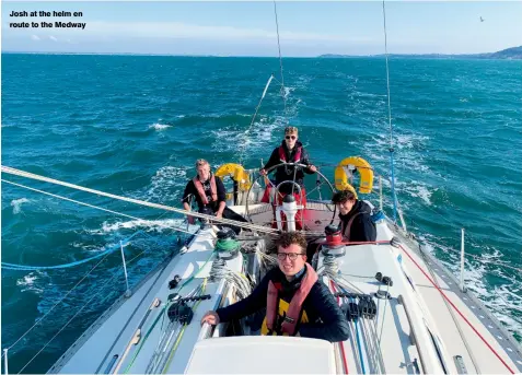  ??  ?? Josh at the helm en route to the Medway