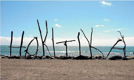  ??  ?? Hokitika’s driftwood sign is always a work in progress.