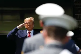  ?? (AP Photo/Alex Brandon) ?? President Donald Trump salutes after speaking to over 1,110 cadets in the Class of 2020 at a commenceme­nt ceremony on the parade field, at the United States Military Academy in West Point, N.Y., Saturday, June 13, 2020.