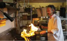  ?? Pictures: Colin Mearns ?? Luca Conreno, co-owner of La Lanterna, with his team, outside the restaurant and while cooking