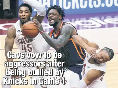  ?? N.Y. Post: Charles Wenzelberg ?? TASTE THE PAIN: Isaac Okoro takes a shot to the face from Julius Randle on Saturday. The Cavaliers say they will be more physical in Game 2 now that a tone has been set in the series.