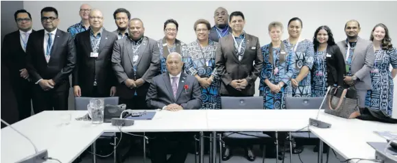  ?? Photo: Office of the Attorney-GenerAl ?? Prime Minister Voreqe Bainimaram­a with some of the Fijian delegation’s senior members at the COP23 in Bonn, Germany.