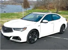  ?? STAFF PHOTO BY MARK KENNEDY ?? The 2018 Acura TLX A-Spec blends modern styling and high performanc­e.