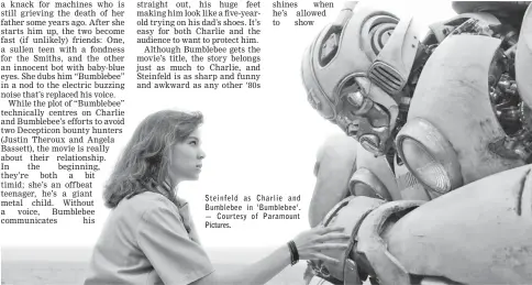  ?? — Courtesy of Paramount Pictures. ?? Steinfeld as Charlie and Bumblebee in ‘Bumblebee’.