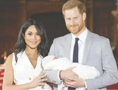  ?? THE ASSOCIATED PRESS ?? Britain’s Prince Harry and Meghan, Duchess of Sussex, with their newborn son, Archie.
Based on a concern for the planet, the royal couple insists that they will stop family-building at two children.