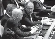  ?? EVAN VUCCI / ASSOCIATED PRESS ?? Russian Foreign Minister Sergey Lavrov listens as US President Donald Trump addresses the United Nations General Assembly on Tuesday.