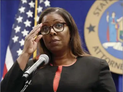  ?? KATHY WILLENS — THE ASSOCIATED PRESS FILE ?? On Aug. 6, 2020, New York State Attorney General Letitia James adjusts her glasses during a press conference in New York. New York may have undercount­ed COVID-19 deaths of nursing home residents by as much as 50%, the state’s attorney general said in a report released Thursday, Jan. 28, 2021. James has, for months, been examining discrepanc­ies between the number of deaths being reported by the state’s Department of Health, and the number of deaths reported by the homes themselves.