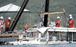  ?? NATHAN PAPES/AP ?? A duck boat that sank in Table Rock Lake in Branson, Missouri, is raised July 23, 2018.