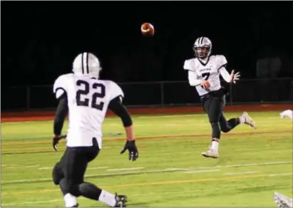  ?? BILL RUDICK — FOR DIGITAL FIRST MEDIA ?? Strath Haven’s Jake Fisher tosses a pass to John Francis Friday against Unionville.