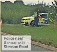  ??  ?? Police near the scene in Stenson Road