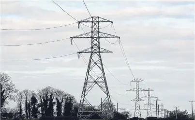  ??  ?? Electricit­y pylons carrying supplies from generators to consumers.