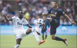  ?? The Canadian Press ?? Vancouver Whitecaps’ Kei Kamara, left, and Los Angeles Galaxy’s Daniel Steres collide duringMLSa­ctioninVan­couverlast­Saturday.Theteamsti­ed0-0.
