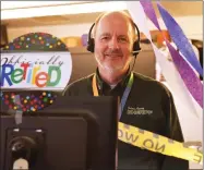  ?? CONTRIBUTE­D PHOTO ?? Emergency dispatcher Jim Reeves is pictured at his work station as he retires from the Tulare County Sheriff’s Office after 25 years, 3 weeks and 12 hours.