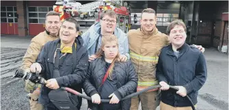  ??  ?? South Hill College students visit Sunderland Central Fire Station. Students from left Ben, Mattinson, Ross Aitchison, Sophie Gray and Hugo Tyrrell. Firefighte­rs from left, Chris Cook and James Parkinson