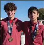  ?? SUBMITTED PHOTO ?? Haverford’s Ethan Fingerhut, right, and Patrick Lawson show off their medals after they finished fourth and 16th, respective­ly, at the PIAA Class 3A boys cross country championsh­ips Saturday. The Fords were fifth as a team.