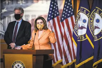  ?? Pete Marovich / New York Times ?? House Speaker Nancy Pelosi says she’s “at the table” and ready to negotiate a coronaviru­s aid package even after President Trump halted talks abruptly earlier in the week.