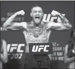  ?? L.E. BASKOW/LAS VEGAS SUN VIA AP ?? MMA fighter Conor McGregor will fight Eddie Alvarez for his lightweigh­t title in the UFC’s debut in New York City in the main event of UFC 205 on Nov. 12 at Madison Square Garden.