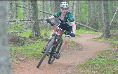  ?? JASON MALLOY/THE GUARDIAN ?? Stanley Bridge’s Marilyn Sheen races in the Tour de Pants Sunday at the Brookvale Nordic Park. The event is the third stage of the Cycling P.E.I. Citizen Mountain Bike Series.