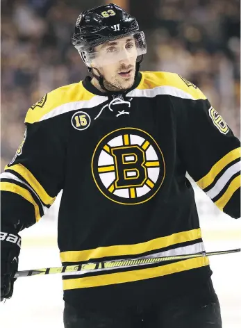  ?? GETTY IMAGES/FILES ?? Boston Bruins forward Brad Marchand is not a fan of the NHL’s new faceoff rule.