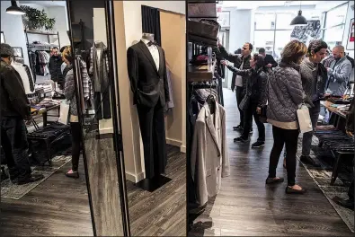  ?? BLOOMBERG NEWS ?? Shoppers browse at a Bonobos Inc. men’s clothing store earlier this month in Greenwich, Conn. Consumer spending rose 0.4 percent in September, while personal incomes rose 0.2 percent, the smallest gain since June 2017, the government reported.