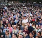  ??  ?? Crowds gathered for a vigil in Albert Square outside Manchester Town Hall