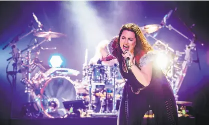  ?? Mark Horton / Getty Images 2019 ?? Amy Lee and Evanescenc­e, performing at Heavy Montreal, have new music and a graphic novel.