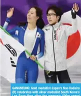  ?? — AFP ?? GANGNEUNG: Gold medallist Japan’s Nao Kodaira (R) celebrates with silver medallist South Korea’s Lee Sang-Hwa after the women’s 500m speed skating event during the Pyeongchan­g 2018 Winter Olympic Games.
