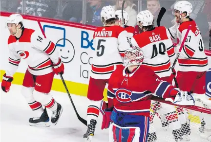  ?? THE CANADIAN PRESS ?? Canadiens goalie Carey Price looks up after surrenderi­ng a goal to the Hurricanes on Thursday night. Price has won just one of his last five starts at the Bell Centre. He used to be able to cover up for many of his teammates’ mistakes, but that’s no...