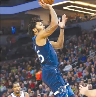  ?? | AP ?? Derrick Rose had two points and went 1- for- 5 fromthe field in his Timberwolv­es debut Sunday.