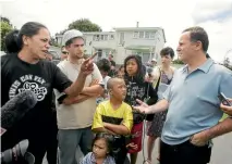  ??  ?? John Key and the media descend on McGehan Close, Auckland, in 2008 after he labelled the street’s residents the ‘‘underclass’’.