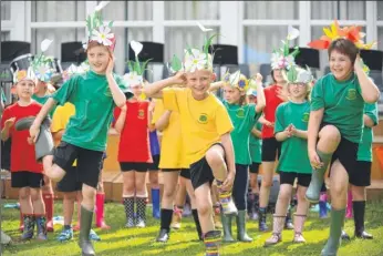  ??  ?? Clockwise, from above, Hamstreet school pupils take part in a South African gumboot dance as part of the Inspire Carnival which aims to encourage youngsters to take part in more activities ahead of the Olympic and Paralympic Games in Rio this year