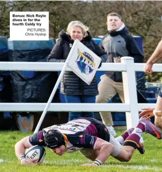  ?? PICTURES: Chris Hyslop ?? Bonus: Nick Royle dives in for the fourth Caldy try