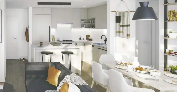  ?? ?? Residences in Ace on The Drive feature a modern but classic esthetic enhanced by bold touches. Countertop­s are quartz and cabinets are sleek in black or a soft white hue.