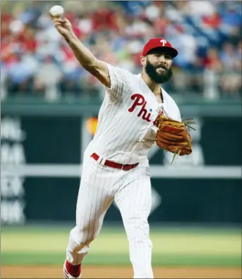  ?? CHRIS SZAGOLA — THE ASSOCIATED PRESS ?? Phillies starting pitcher Jake Arrieta delivers during the first inning against the Braves on Friday.