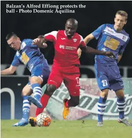  ??  ?? Balzan’s Alfred Effiong protects the ball - Photo Domenic Aquilina