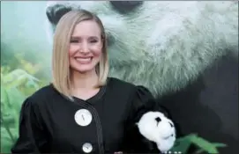  ?? PHOTO BY WILLY SANJUAN — INVISION — AP ?? In this file photo, Kristen Bell holds a stuffed panda teddy bear at the LA Premiere of “Pandas” in Los Angeles. Bell narrates the documentar­y which will be in wide release beginning Friday.