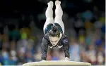  ?? MICHAEL DODGE / GETTY IMAGES ?? Stella Ashcroft, 15, on the vault. She landed badly, jarring her neck and injuring her knee.