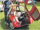  ??  ?? steve Fisk with his dad’s Heinkel bubble car, which now entertains his young family.