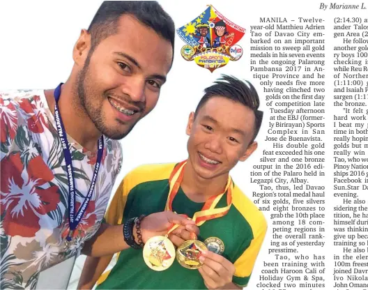  ?? CONTRIBUTE­D PHOTO ?? FIRST DAY HAUL. Davao Region tanker Matthiew Adrien Tao, who hails from Davao City, poses with his coach Haroon Cali after bagging two gold medals on Day 1 of the Palarong Pambansa 2017 swimming competitio­n late Tuesday afternoon at the EBJ Sports...